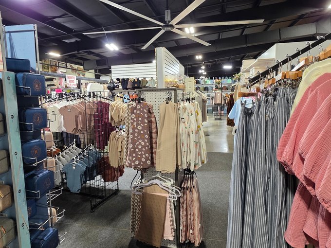 Shoppers browsing apparel in person at Ohio's Market Berlin in Berlin, OH