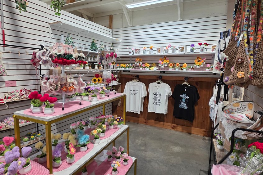 Curated clothing selection at Ohio's Market Berlin in Holmes County, OH