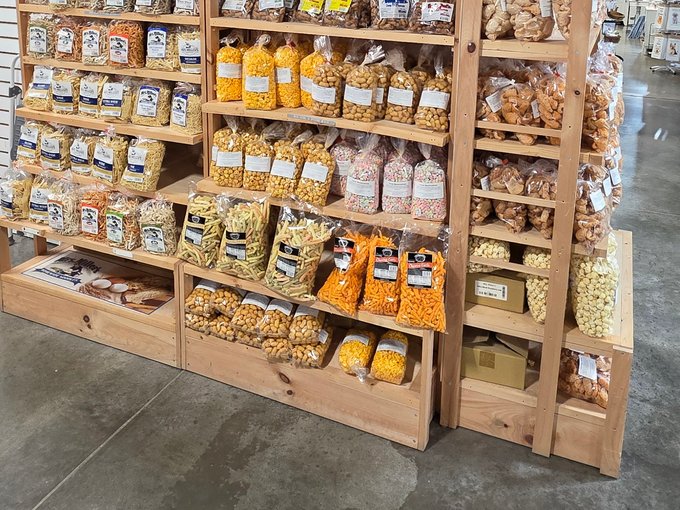 Hand-picked snacks and candy on a vendor shelf at Ohio's Market Berlin in Berlin, OH