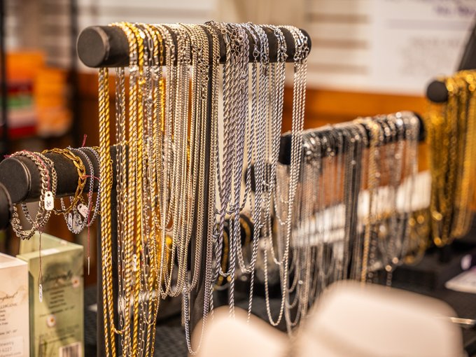 Hand-picked rings and necklaces in a vendor case at Ohio's Market Berlin in Berlin, OH